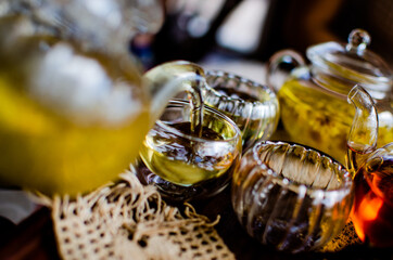 Tea pot and cup clear color natural herbal flower, chamomile, Japanese and Chinese green tea, rose....