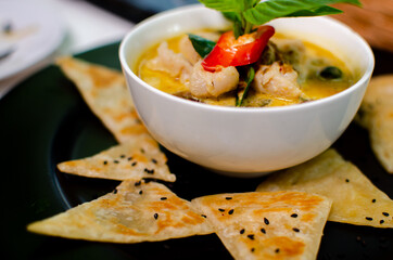 Chicken green curry with roti sheets 