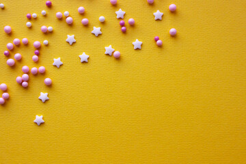 Decorations for pastry on yellow background