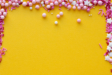 Decorations for pastry on yellow background