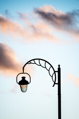artistic street lamp at sunset in Brussels