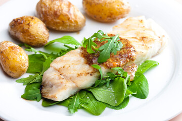 Still lifepikeperch with spinach and potatoes