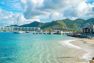 Fototapeta na wymiar The caribbean island of St.Maarten landscape and Citiscape. Pelican beach located in the Caribbean island of St Maarten. 