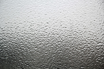Beautiful frosted glass pattern. Ice on the window.