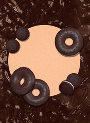 3d render fashion collage scene. Chocolate donuts and cookies mix on creamy  textured background. Minimalistic creative food style art. Copy space