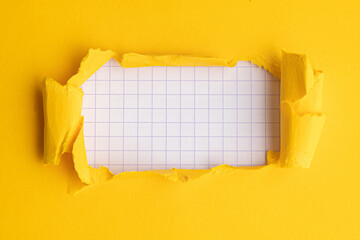 Circle hole in yellow paper with a white background. Circle frame for text or logo, copy space.