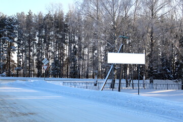 winter road with a platform with space for a seat