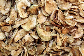 texture of dried apples cut into thin slices.