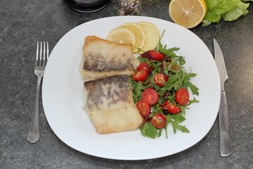 fried congrio fish with vegetables for lunch