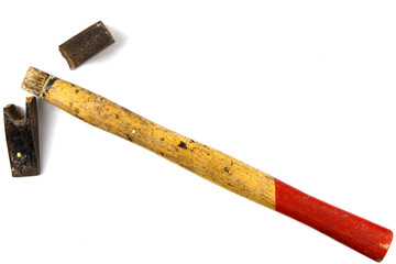 Broken hammer with a wooden handle on a white background. Isolated.