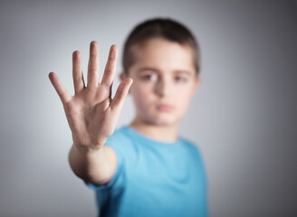 Say NO to bullying with hand stop gesture