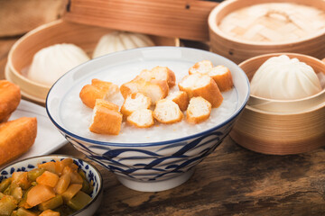 Chinese porridge breakfast set, fried dough sticks, white porridge,
