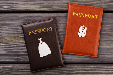 Marriage and travel concept. Top view flat lay. Grey desk background.