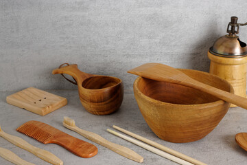Household wooden utensils and accessories. Bathroom and kitchen objects made of wood.