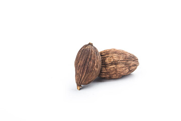 Black cardamom on a white background