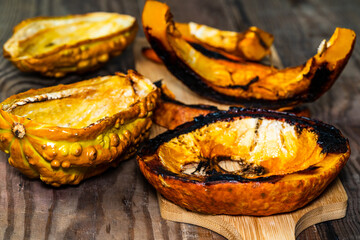 baked pumpkin on a wooden table