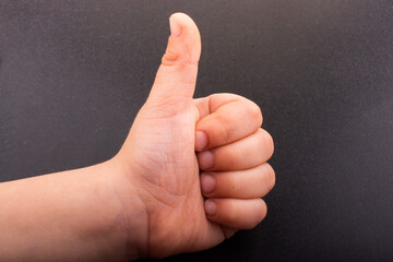 Hand with thumb up isolated in view