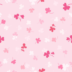 Seamless pattern with clover leaves.Magical plant. Background for St. Patrick's Day. Colorful endless backdrop with trefoils and quatrefoils. Shamrock. Irish story.