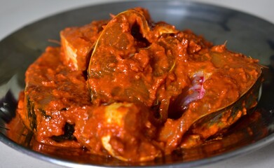 Fish pieces pasted with spicy masala, a south Indian kerala dish with fish, Fish for fry in malabar style 
