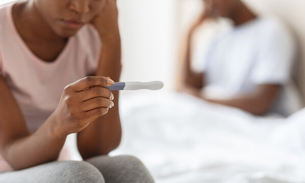 Unrecognizable Black Woman Holding Pregnancy Test, Unintended Pregnancy Concept