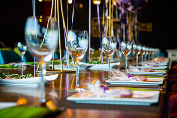 Wine glasses placed on a festive table
