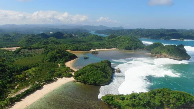 Idyllic landscape of Asmara beach, East Java coast, Indonesia, aerial view