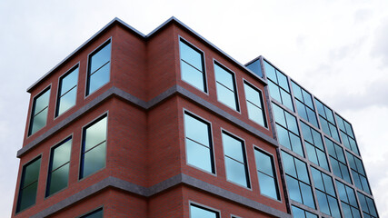 Obraz premium red brick facade and glass two building office towers skyscraper 3D illustration
