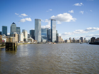 Fototapeta na wymiar River Thames and Canary Wharf skyline, London, UK