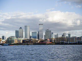 Fototapeta na wymiar River Thames and Canary Wharf skyline, London, UK