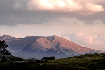 Mountain peak among clouds