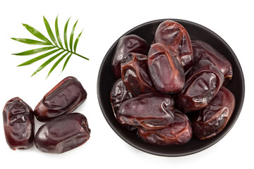 date fruits with green leaves isolated on white background. clipping path. top view