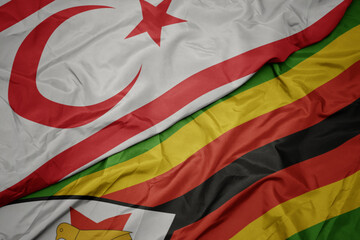waving colorful flag of zimbabwe and national flag of northern cyprus.