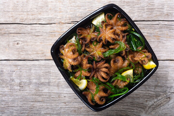 Baby octopus fried with lemon