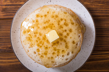 Moroccan traditional eating . Pancakes with honey
