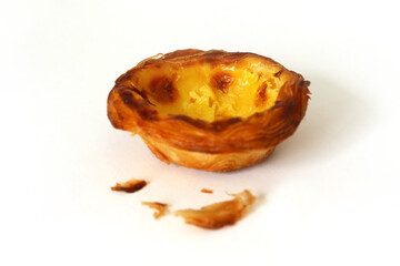 Portuguese custard pastry called a pasteis de nata isolated on white background