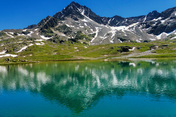 Fototapeta na wymiar Passo Gavia, mountain pass in Lombardy, Italy, at summer. Lake