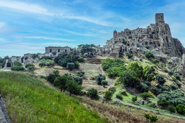 landscape of the ghost town of Craco, with abandoned houses in ruins due to a landslide