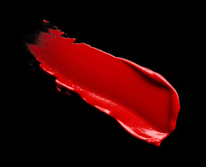 Red lipstick stroke isolated on black background