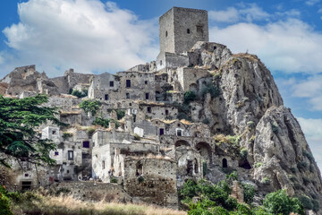 landscape of the ghost town of Craco, with abandoned houses in ruins due to a landslide