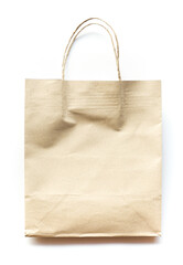 Brown recycle paper carrier bag with handles for shopping on white background 