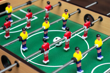 Close up of a table soccer game. Table football is a toy for children