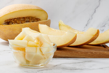 Sliced to pieces of melon. Melon Cut in a Bowl
