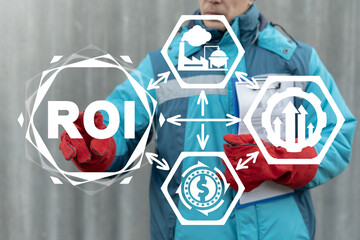 Industry and business concept of ROI Return On Investment. Industry engineer touching on virtual...