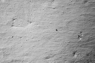 Texture of a concrete wall with cracks and scratches which can be used as a background