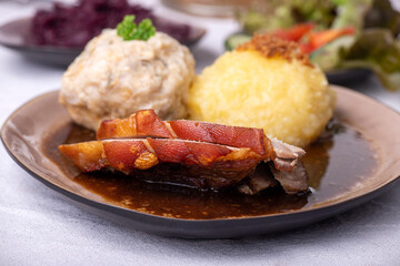 bavarian roasted pork with different dumplings