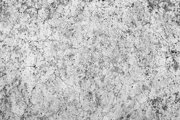 Texture of a concrete wall with cracks and scratches which can be used as a background