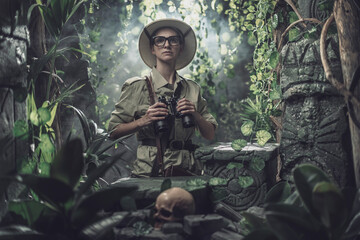 Brave woman exploring the tropical jungle