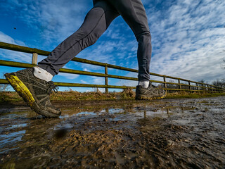 Running on a muddy trail