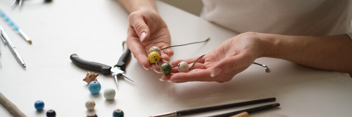 Craft jewelery making with professional tools. A handmade jeweler process, manufacture of jewellery.
