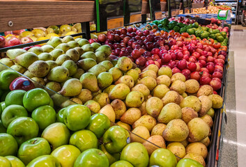 fruits for sale in the organized market with selective focus and blur